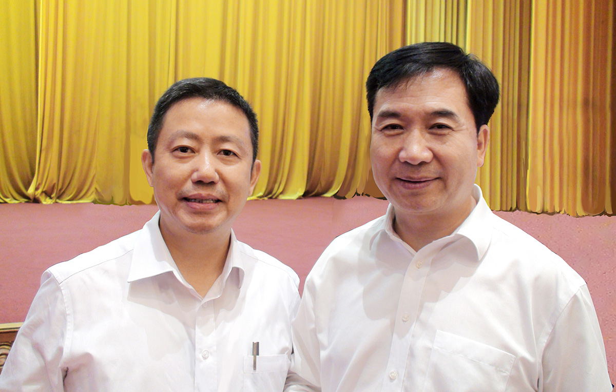 中央政治局常委、中央纪律检查委员会书记李希与周海江合影